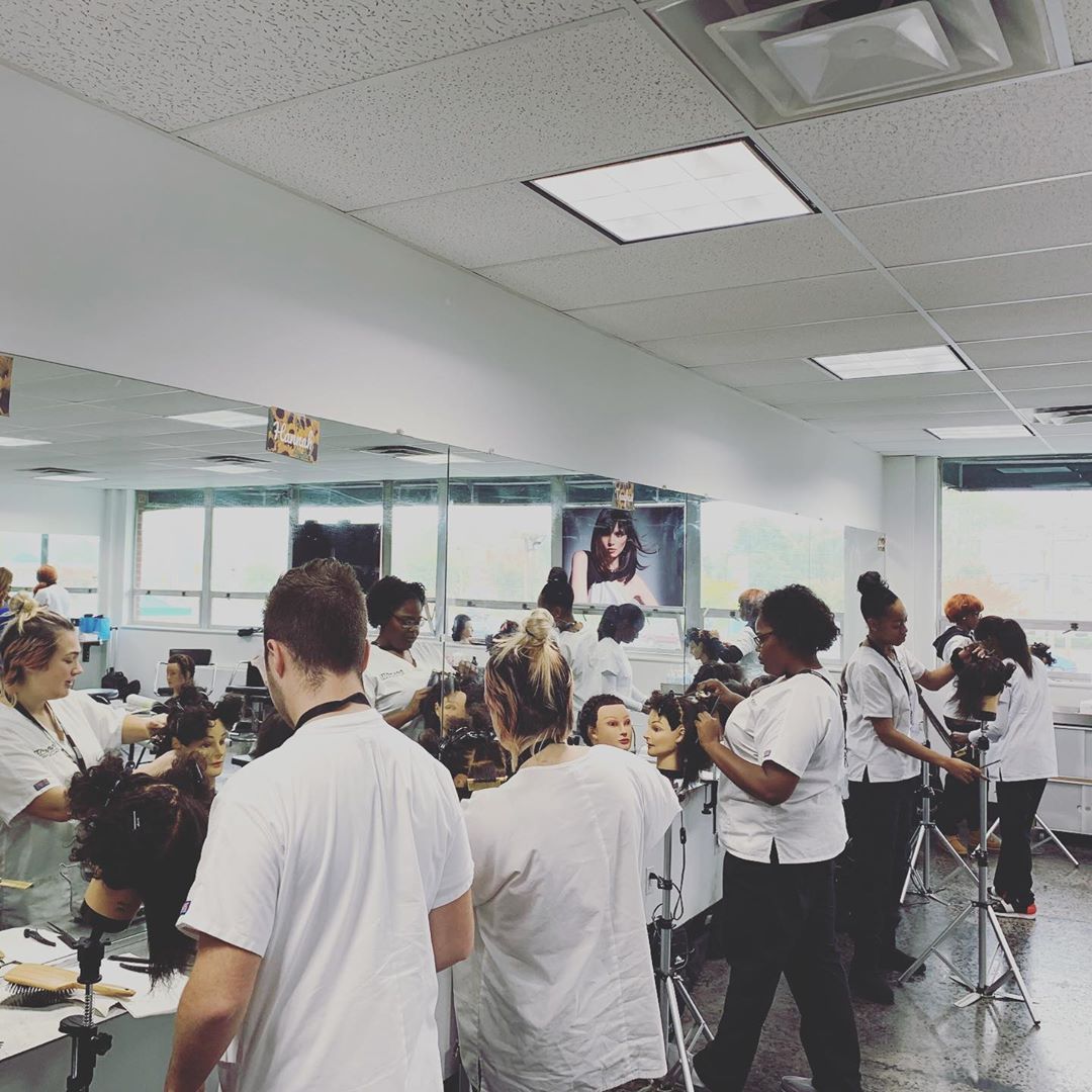 Cosmetology students practicing skills